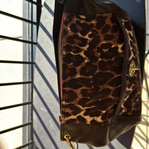 Authentic Coach Purse in a Leopard Print and Brown Leather. - Picture 11 of 12